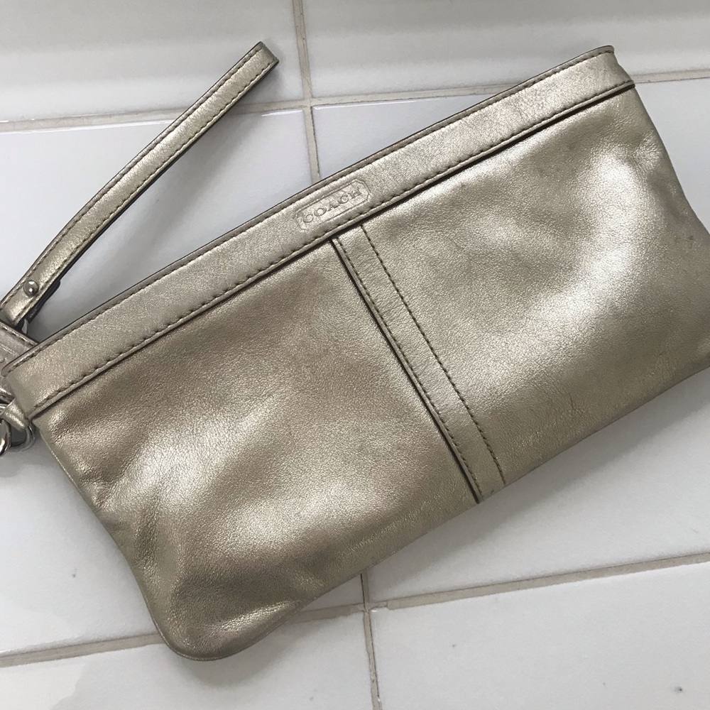 Coach gold leather clutch wristlet
